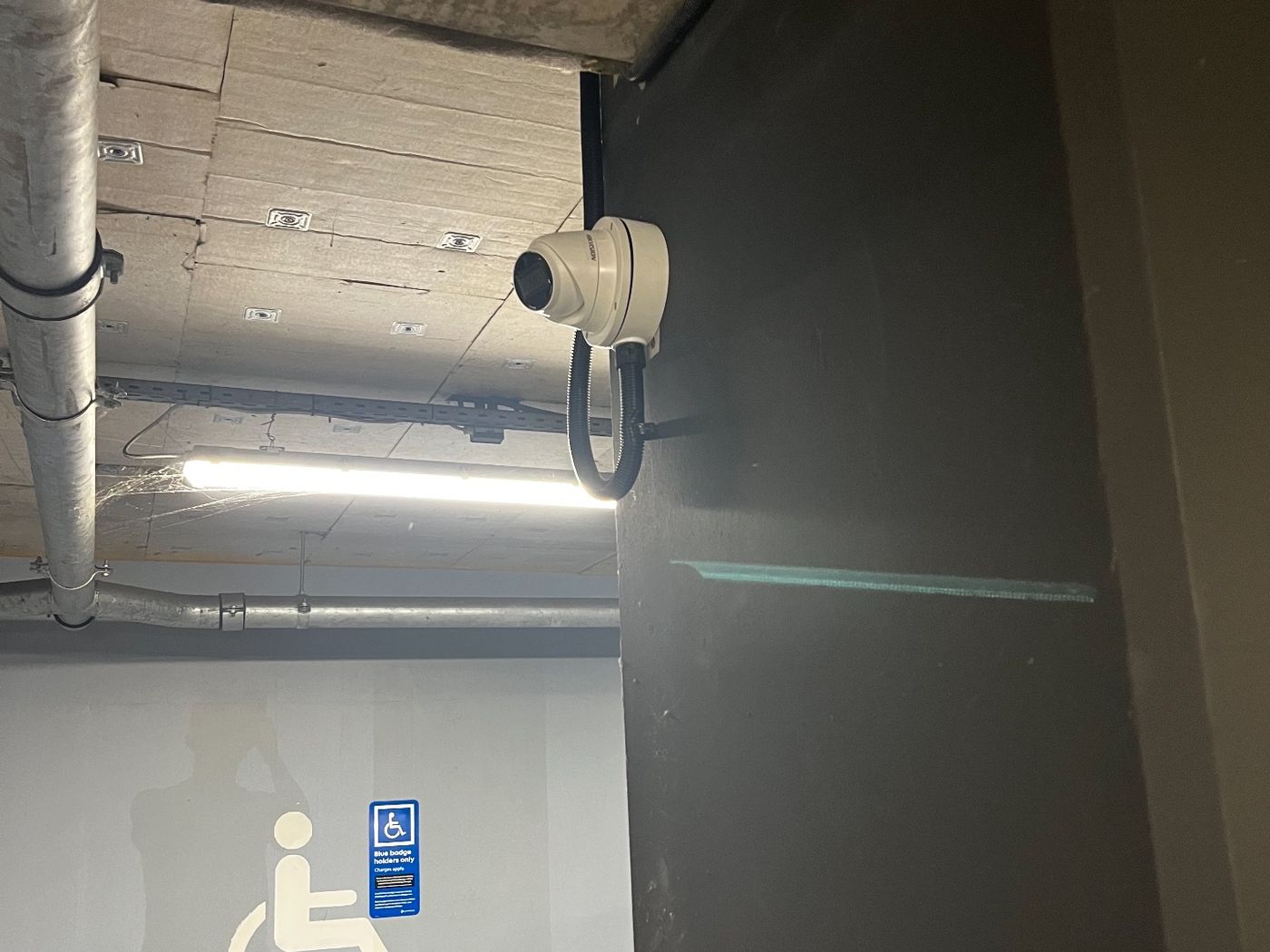 CCTV camera installed and cabled in a commercial corridor
