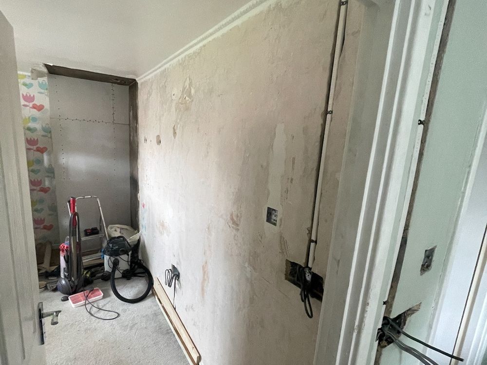House rewire in progress with new socket back boxes and cabling
