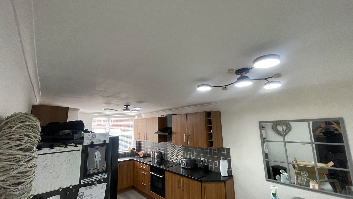 New ceiling lighting installed in a domestic kitchen