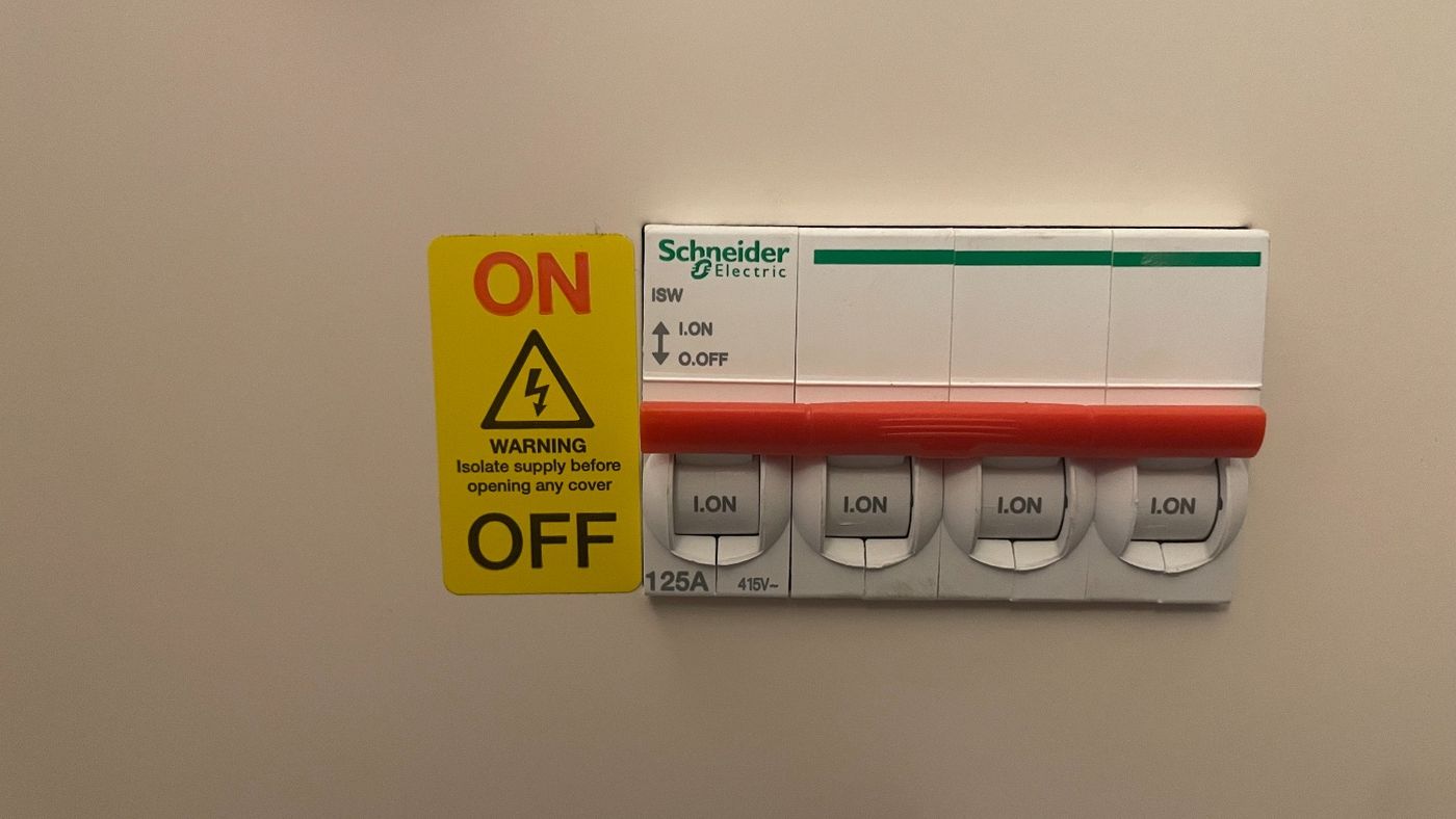 Main switch isolator labelled during electrical testing