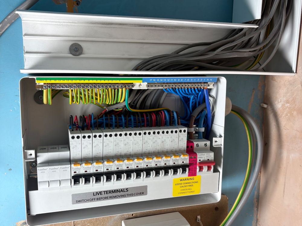 New fuse board installed and wired with labelled live terminals