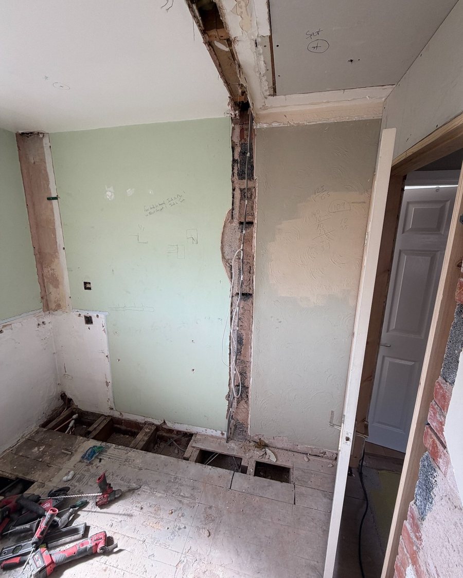 Bathroom stripped back to the walls and floor joists ready for electrical first fix