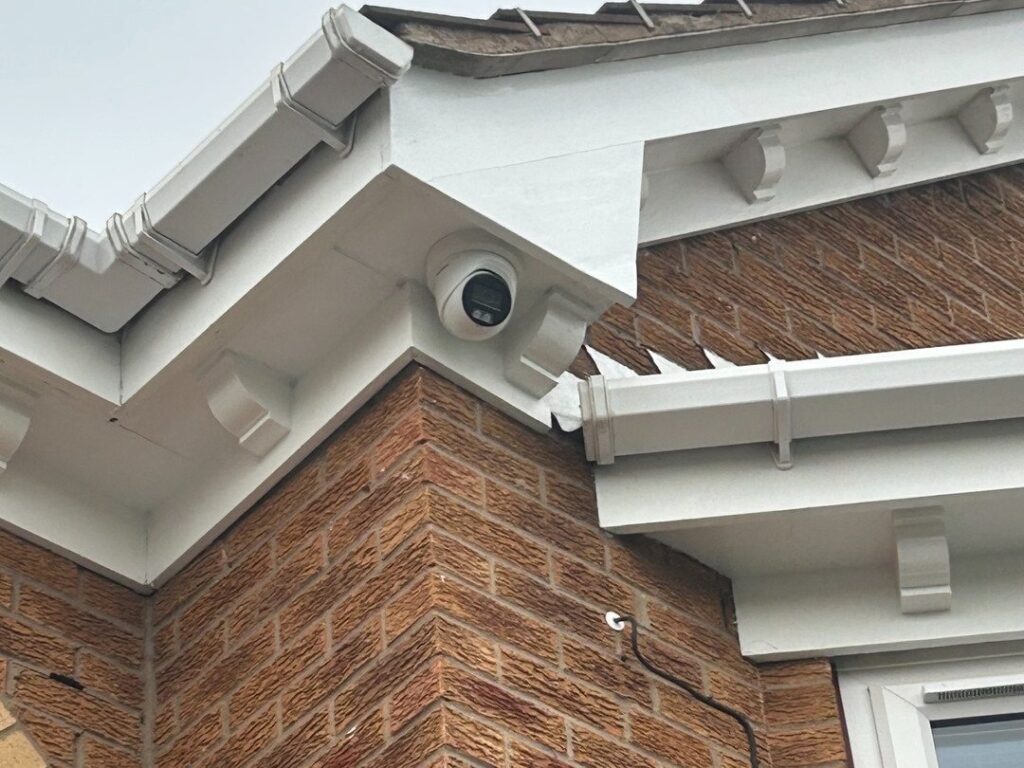 Home CCTV installation - turret camera fitted under the soffit at the corner of a house